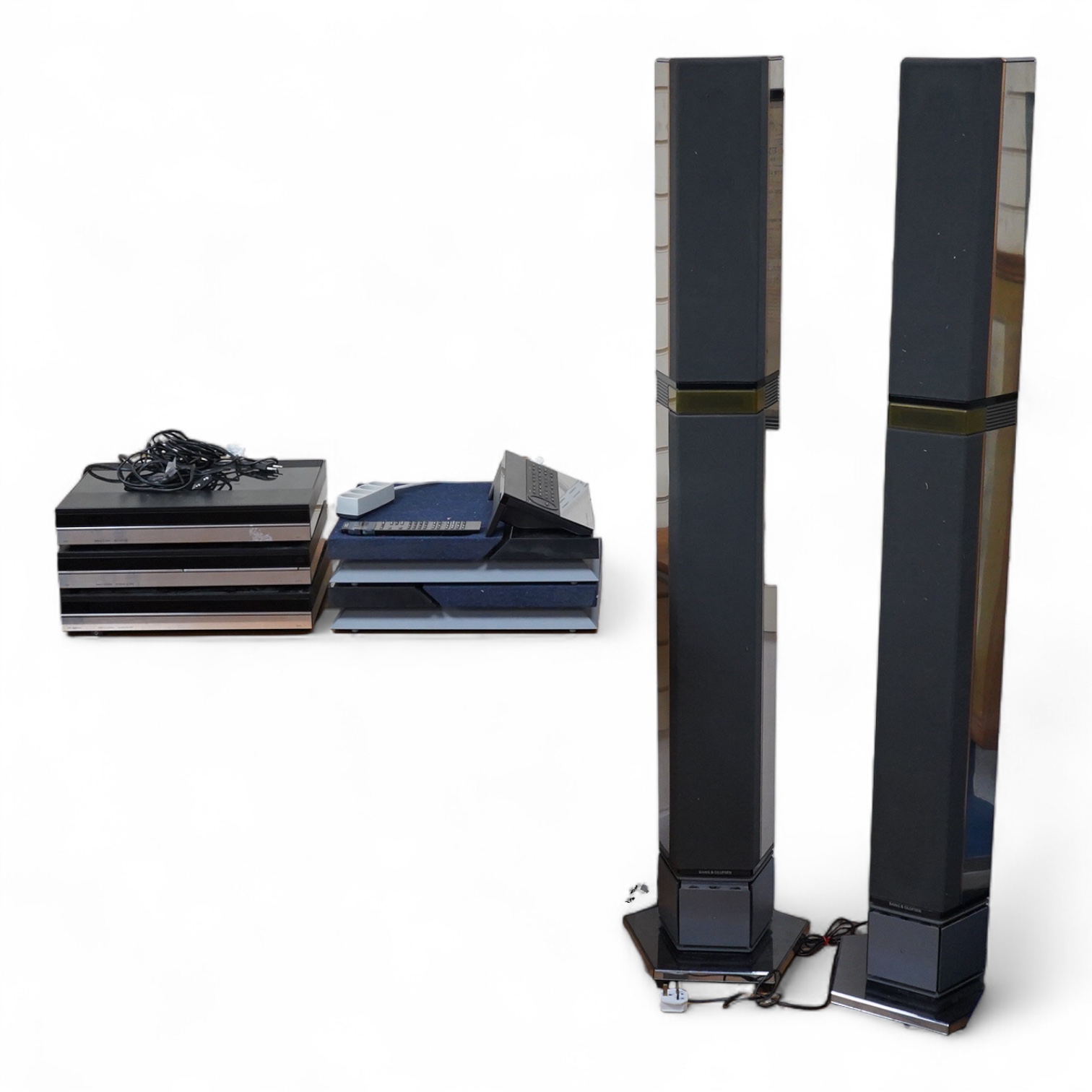 A Bang and Olufsen 6500 hi-fi system, comprising of a Beocord 6500, a Beogram CD 6500, a Beomaster 6500, and a master control panel, together with a pair of floor standing pedestal speakers, 164cm high, and pair of type